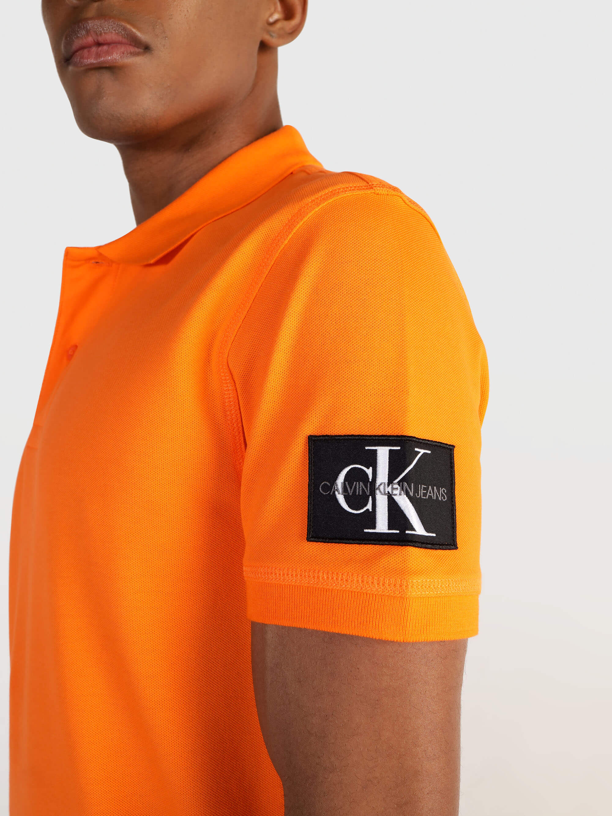 Polo Calvin Klein Logo Hombre Naranja