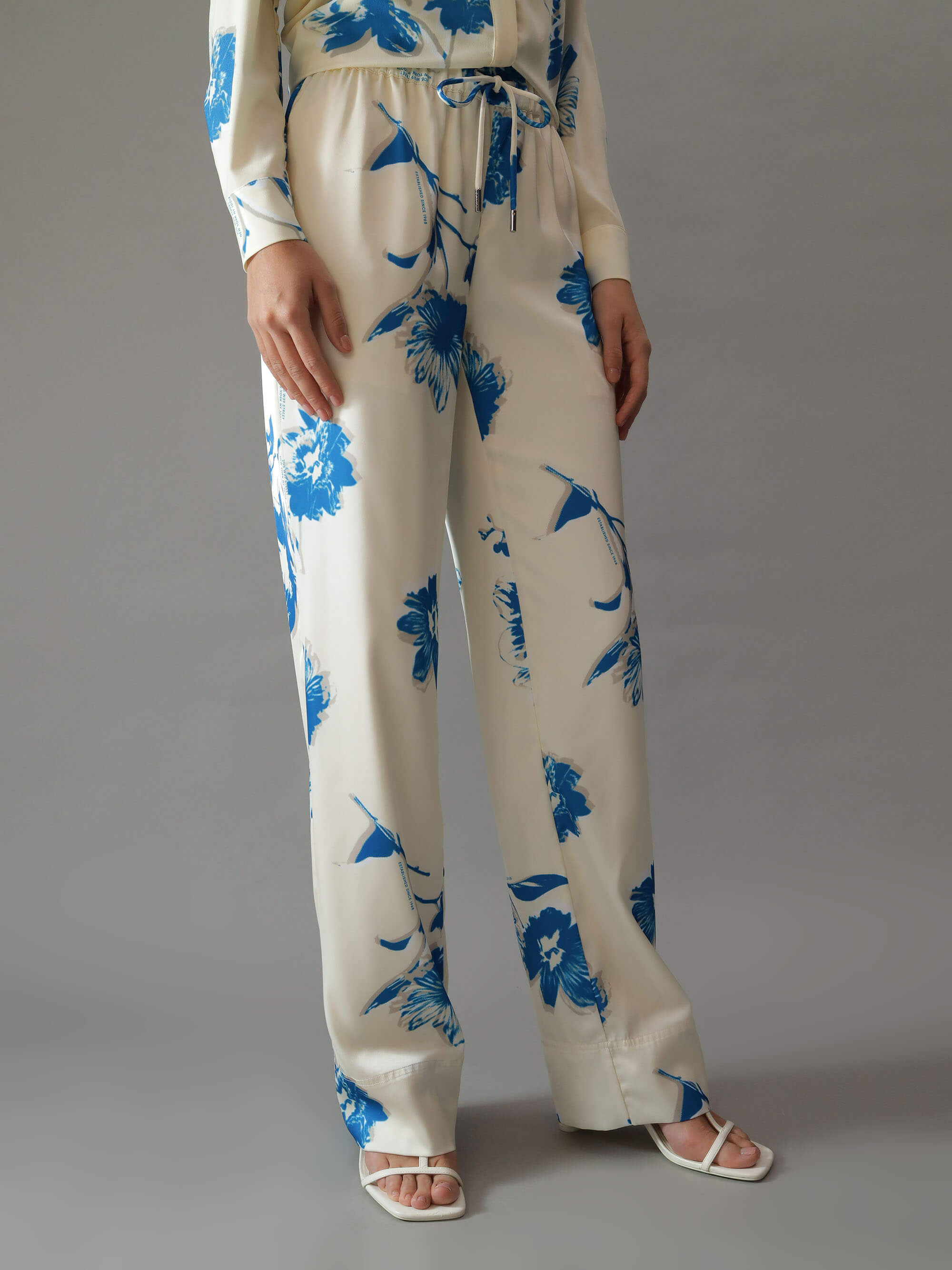 Pantalón Calvin Klein con Flores Mujer Beige