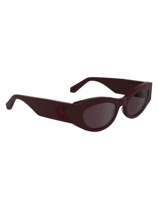 Lentes-Calvin-Klein-Monturas-Gruesas-Ovaladas-Morado