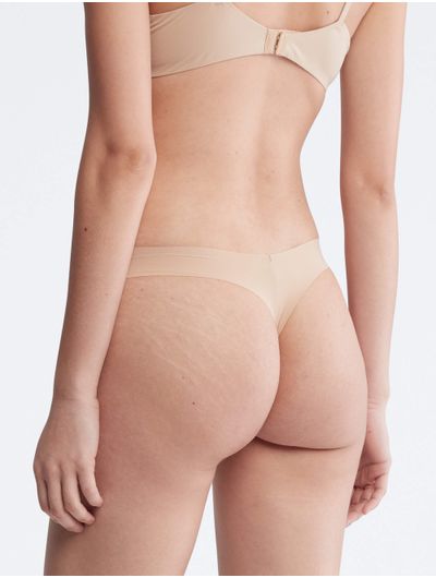 Tanga-Calvin-Klein-Invisibles-Mujer-Beige