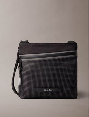 Bolso-Calvin-Klein-Reflect-Flatpack-Hombre-Negro-4D3227G-UB1