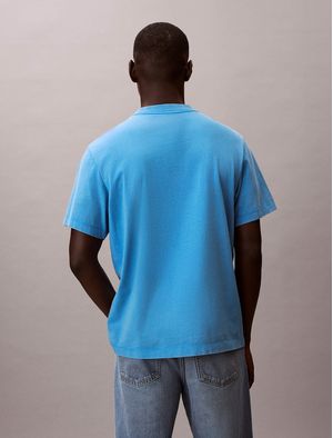 playera-calvin-klein-20s-graphic-acid-wash-hombre-azul-4rb824g-cfm