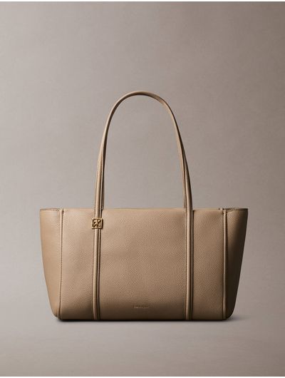 bolsa-calvin-klein-emblem-peble-mujer-beige-4f3424g-vfu